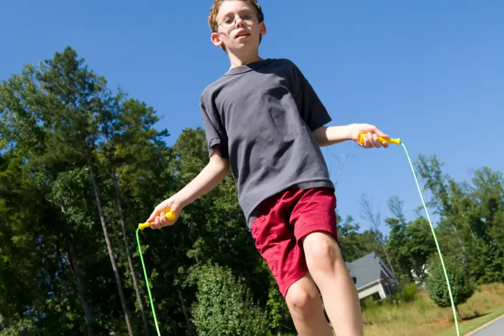 boy jumping rope